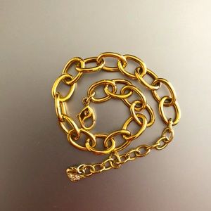 Swarovski like-new gold-tone charm bracelet